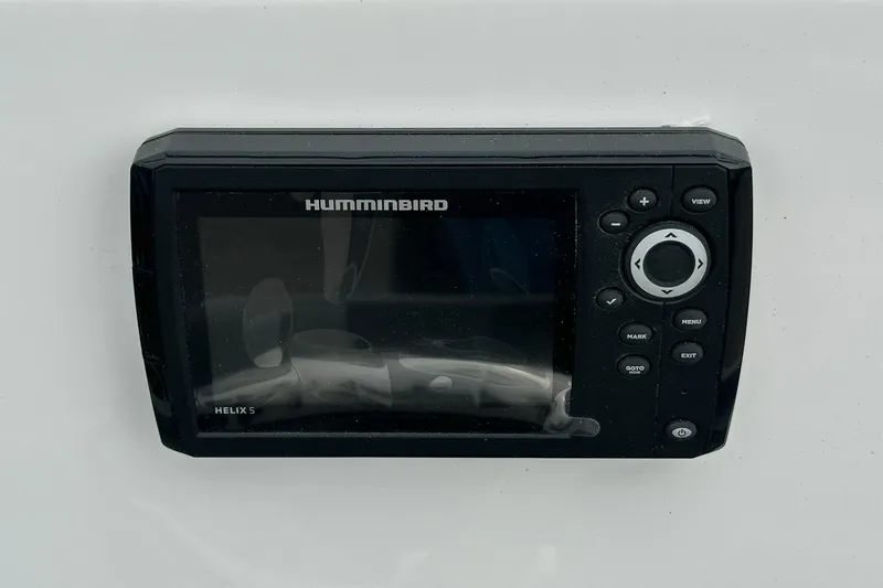 Slide: The Image of Humminbird Helix 5 fish finder on 2026 Vexus Defender 201 boat dashboard. - 25