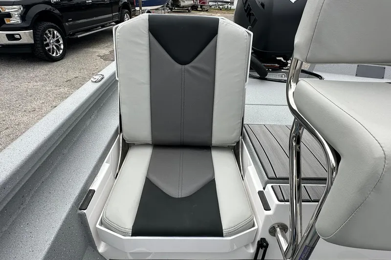 Slide: The Image of 2026 Vexus Defender 201 boat seat with gray and black upholstery. - 30