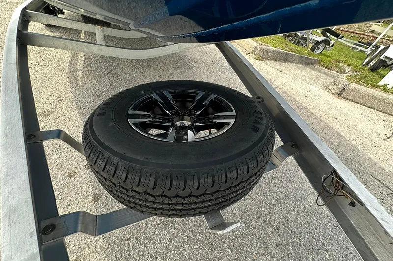 Slide: The Image of Spare tire mounted on a Vexus Defender 201 trailer, 2026 model. - 36