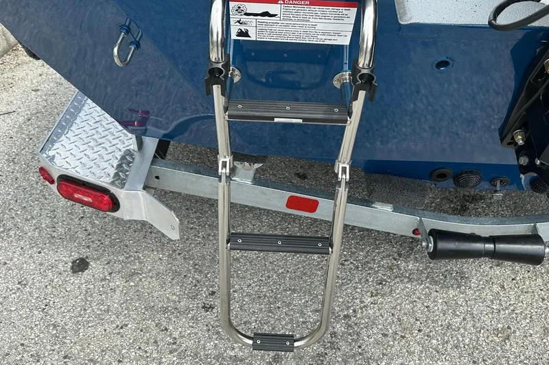 Slide: The Image of Rear view of 2026 Vexus Defender 201 boat ladder on trailer. - 42