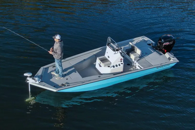 Slide: The Image of Manufacturer Provided Image: 2026 Vexus Defender 201 boat with person fishing on calm water. - 47