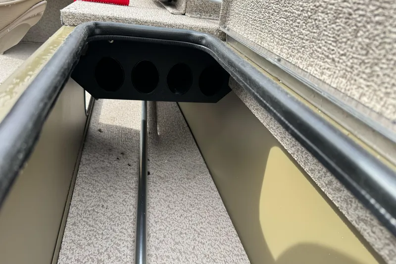 Slide: The Image of Interior view of 2026 Lund 2075 Alaskan SS boat, showcasing rod storage compartment. - 20