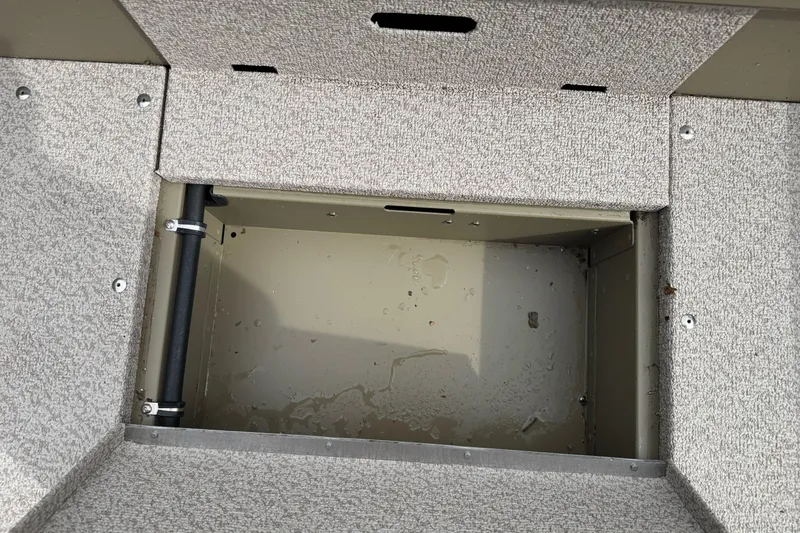 Slide: The Image of Open storage compartment in 2026 Lund 2075 Alaskan SS boat interior. - 21