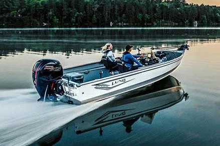 Slide: The Image of Manufacturer Provided Image: 2025 Lund 2075 Alaskan SS boat cruising on a serene lake. - 7