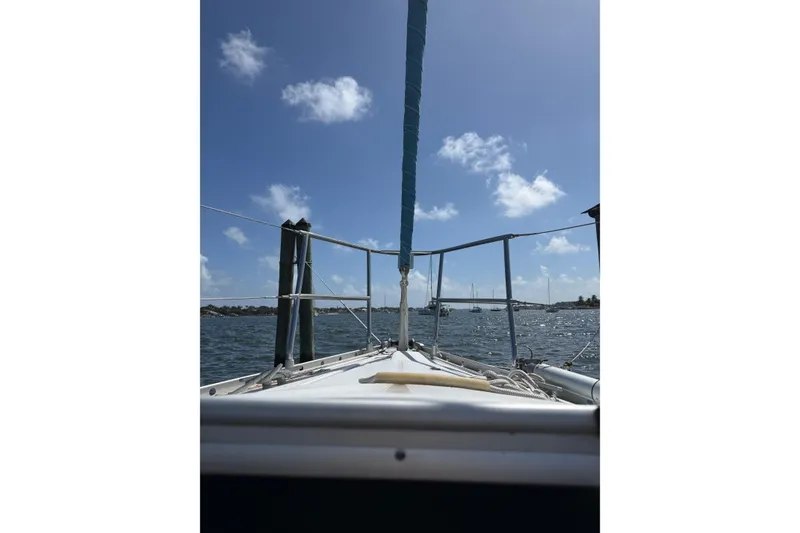 Slide: The Image of Sailing view from a 1990 Beneteau First 32s5 yacht on a sunny day. - 9