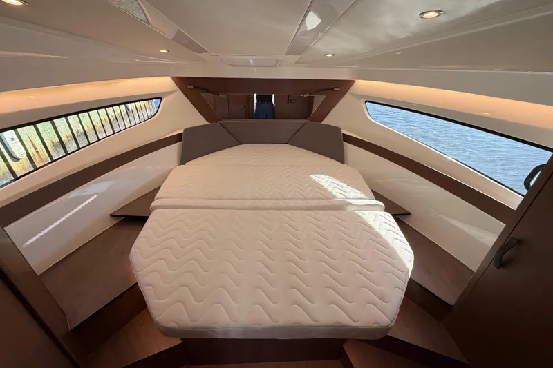 Slide: The Image of Luxurious cabin interior of 2026 Beneteau Antares 11 Fly yacht with modern design. - 16