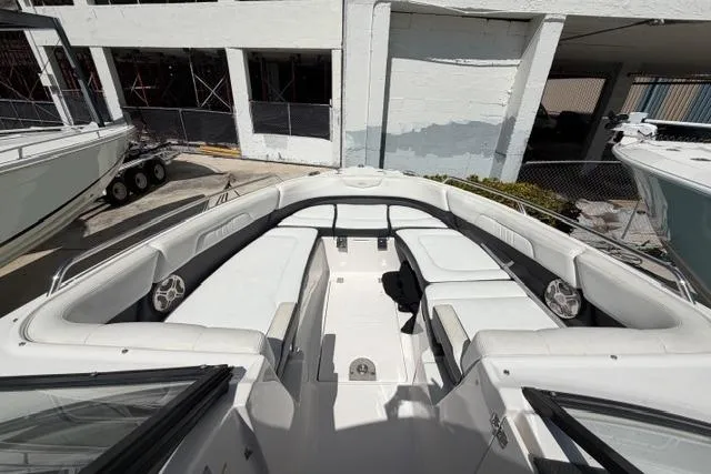 Slide: The Image of 2013 Chaparral 277 SSX boat with spacious seating and modern design. - 9
