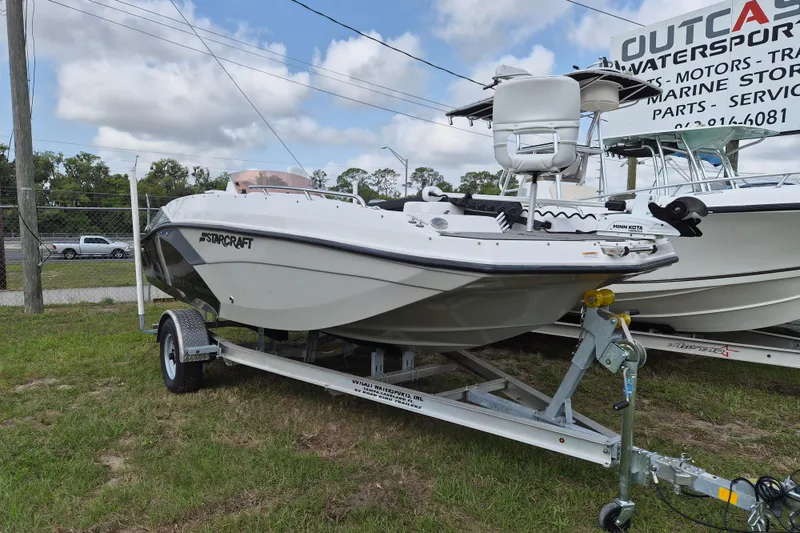 The Image of 2023 Starcraft SVX 171 OB boat on trailer, displayed outdoors. - 1