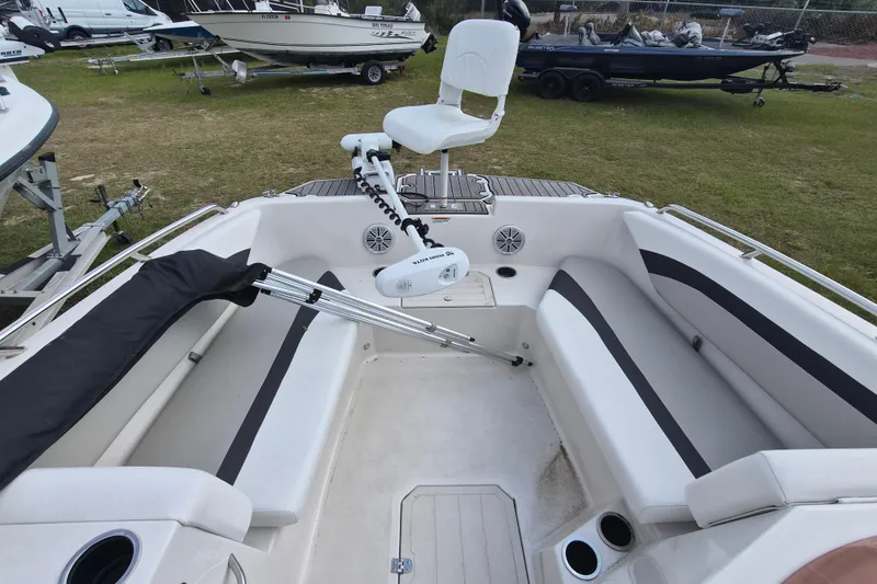 Slide: The Image of 2023 Starcraft SVX 171 OB boat interior with seating and trolling motor. - 10