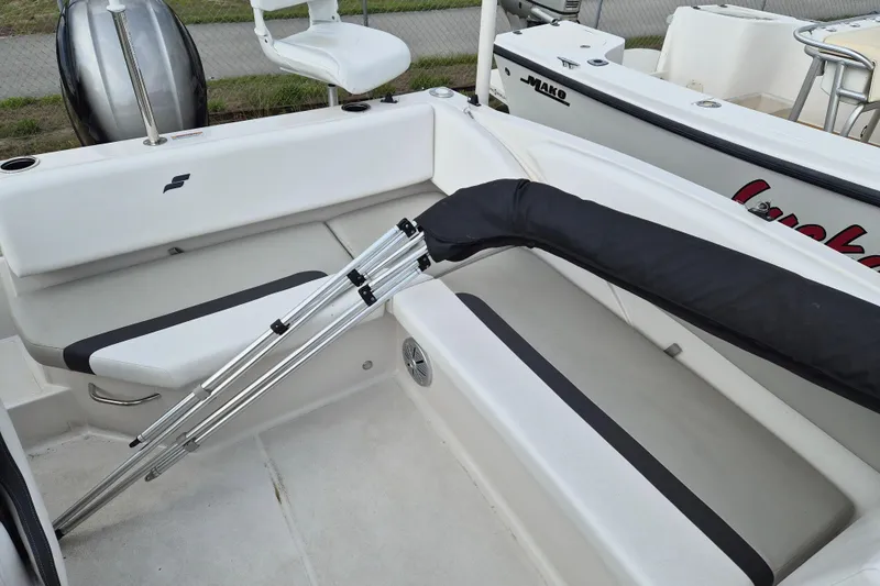 Slide: The Image of 2023 Starcraft SVX 171 OB boat interior with seating and folded canopy. - 6