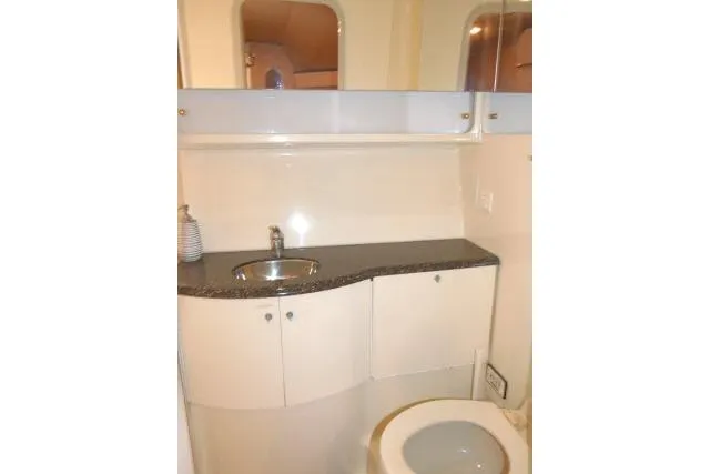 Slide: The Image of 2003 Thunderbird Formula 40PC yacht bathroom with sink and toilet. - 17