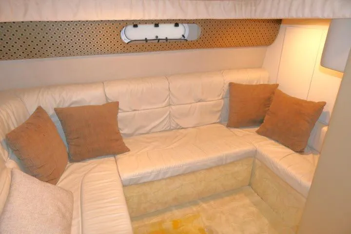 Slide: The Image of Luxurious interior of 2003 Thunderbird Formula 40PC yacht with plush seating and cushions. - 20