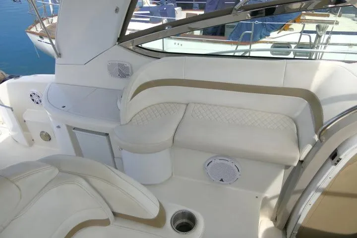 Slide: The Image of 2003 Thunderbird Formula 40PC boat interior with white seating and modern design. - 29