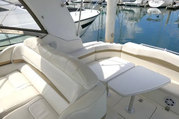Slide: The Image of Luxurious seating area on a 2003 Thunderbird Formula 40PC yacht at a marina. - 37