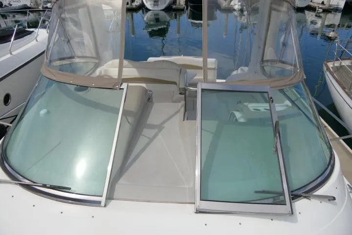 Slide: The Image of 2003 Thunderbird Formula 40PC yacht with open windshield, docked at marina. - 46