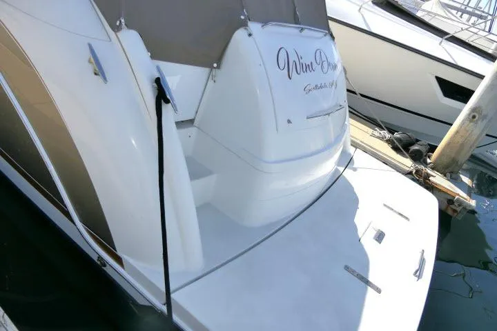 Slide: The Image of 2003 Thunderbird Formula 40PC yacht docked at marina, rear view. - 47