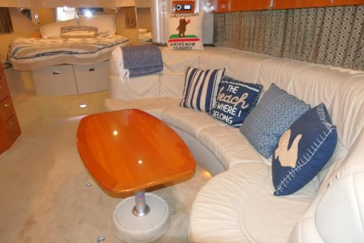 Slide: The Image of Luxurious interior of a 2003 Thunderbird Formula 40PC yacht with cozy seating and nautical decor. - 5