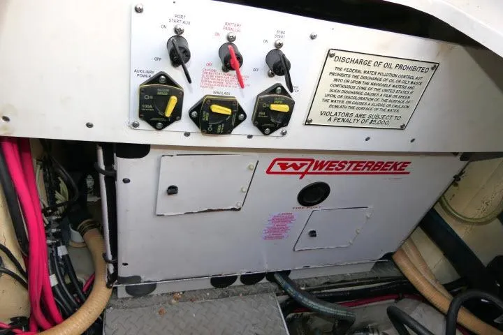 Slide: The Image of Control panel of a 2003 Thunderbird Formula 40PC boat with Westerbeke generator. - 57