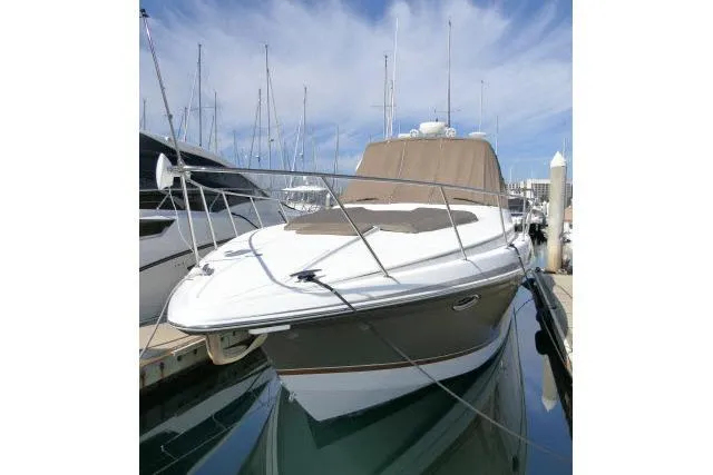 Slide: The Image of 2003 Thunderbird Formula 40PC yacht docked at marina under blue sky. - 61