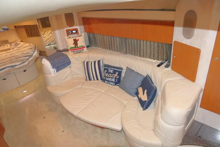 Slide: The Image of Interior of 2003 Thunderbird Formula 40PC yacht with cozy seating and nautical decor. - 7