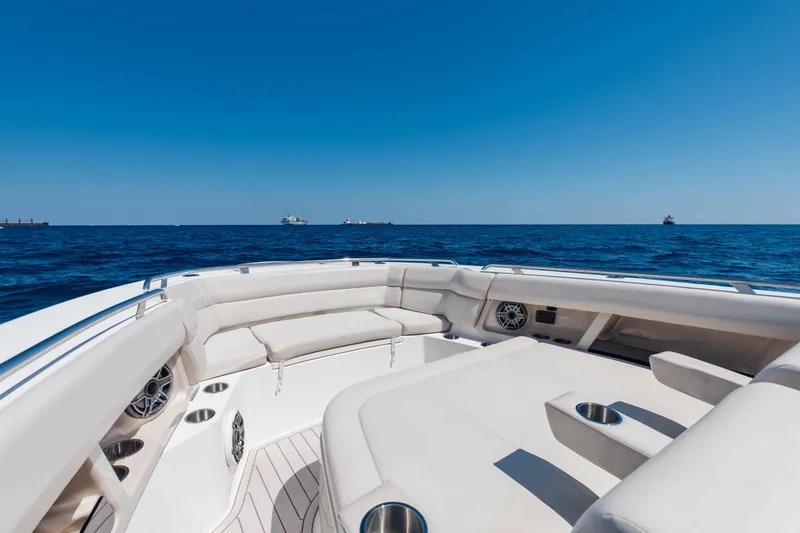 Slide: The Image of 2021 Boston Whaler 350 Realm helm with advanced navigation displays and controls. - 21