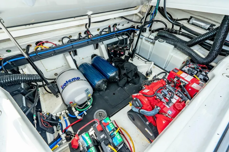 Slide: The Image of Engine compartment of 2023 Monterey 350 Sport Yacht, showcasing mechanical components and wiring. - 33