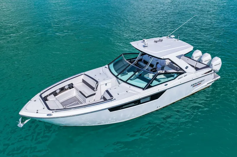 Slide: The Image of 2023 Monterey 350 Sport Yacht on clear blue water, showcasing sleek design and luxury features. - 36