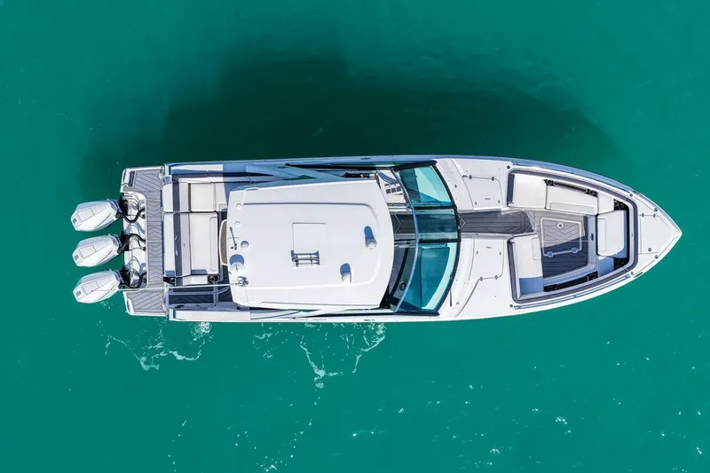 Slide: The Image of Top view of 2023 Monterey 350 Sport Yacht on turquoise water. - 41