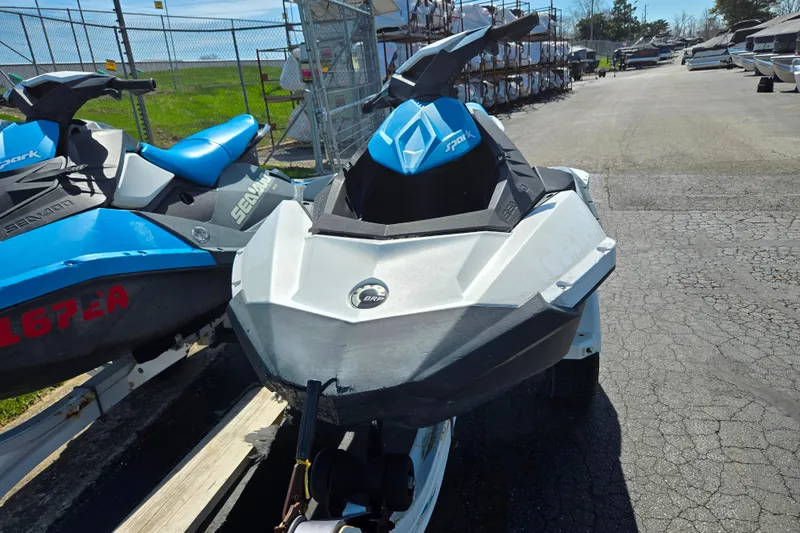 Slide: The Image of 2020 Sea-Doo Spark 2up jet ski parked on a trailer in a marina. - 5