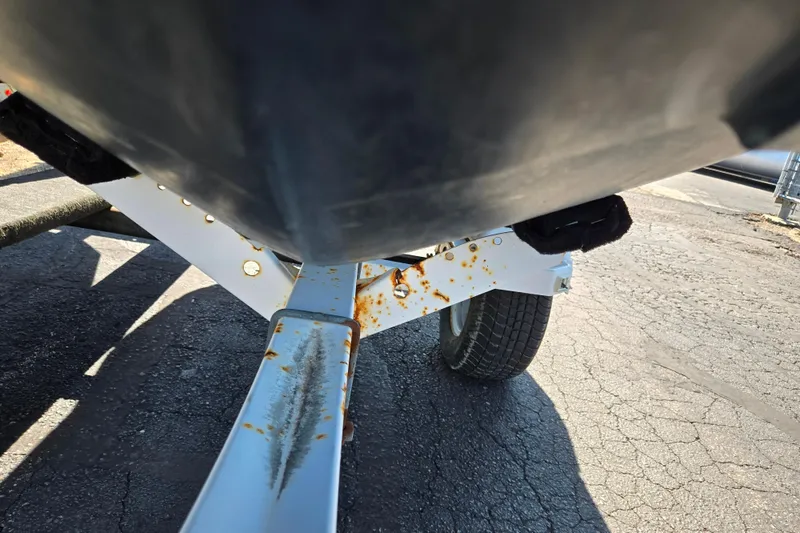 Slide: The Image of Underneath view of a 2020 Sea-Doo Spark 2up on a trailer with rust spots. - 6