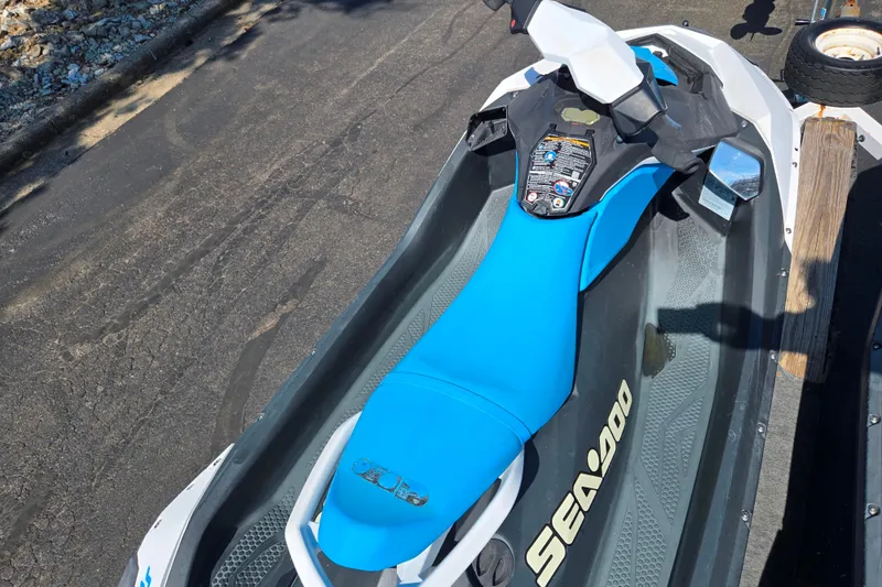 Slide: The Image of 2020 Sea-Doo Spark 2up jet ski with blue seat on a trailer. - 9