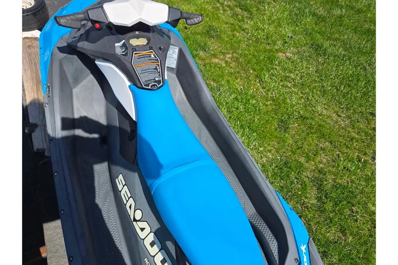 Slide: The Image of 2017 Sea-Doo Spark 2up jet ski with blue seat on grass. - 10