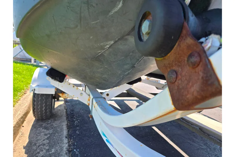 Slide: The Image of 2017 Sea-Doo Spark 2up on trailer, showing underside and rusted components. - 7