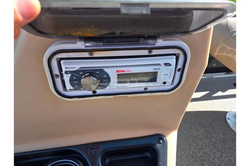 Slide: The Image of Boat stereo system on 2016 Sun Tracker Bass Buggy 18 DLX with Bluetooth and USB features. - 26
