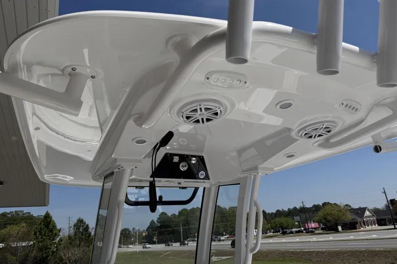 Slide: The Image of 2026 Sportsman Open 252 Center Console boat's overhead view with speakers and rod holders. - 22