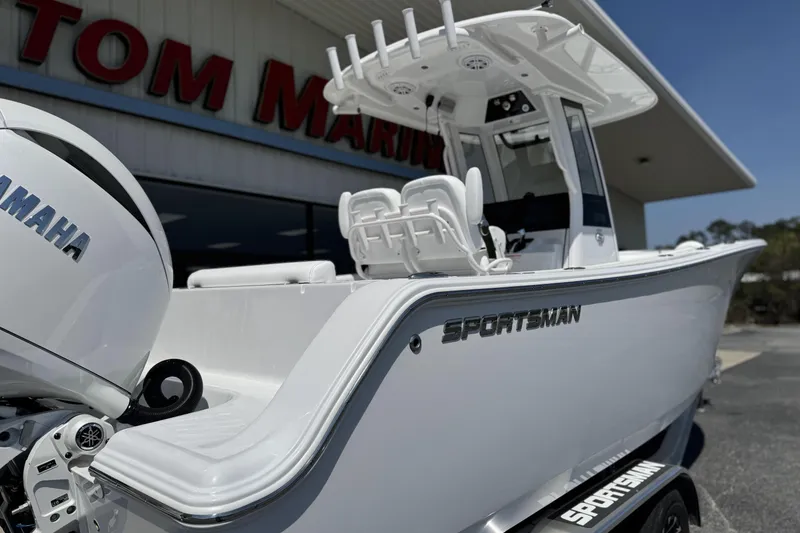 Slide: The Image of 2026 Sportsman Open 252 Center Console boat with Yamaha engine at dealership. - 8