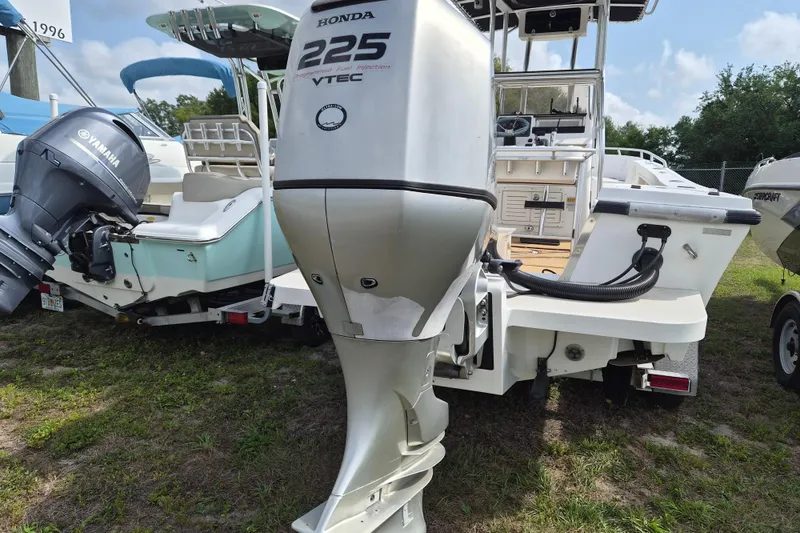 Slide: The Image of 2002 Mako 221 Center Console boat with Honda 225 VTEC outboard motor. - 3