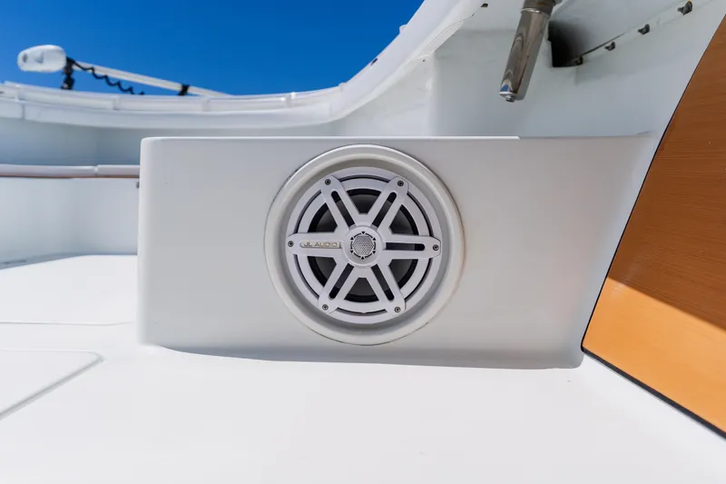 Slide: The Image of 2017 Barker Boatworks 26 featuring JL Audio speaker on deck. - 12
