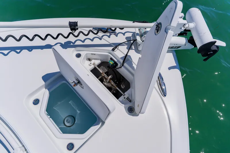 Slide: The Image of 2017 Barker Boatworks 26 showing open storage compartments on deck. - 13