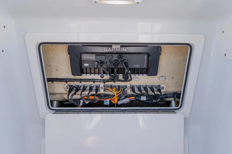 Slide: The Image of Electrical panel of 2017 Barker Boatworks 26 with Garmin equipment. - 19