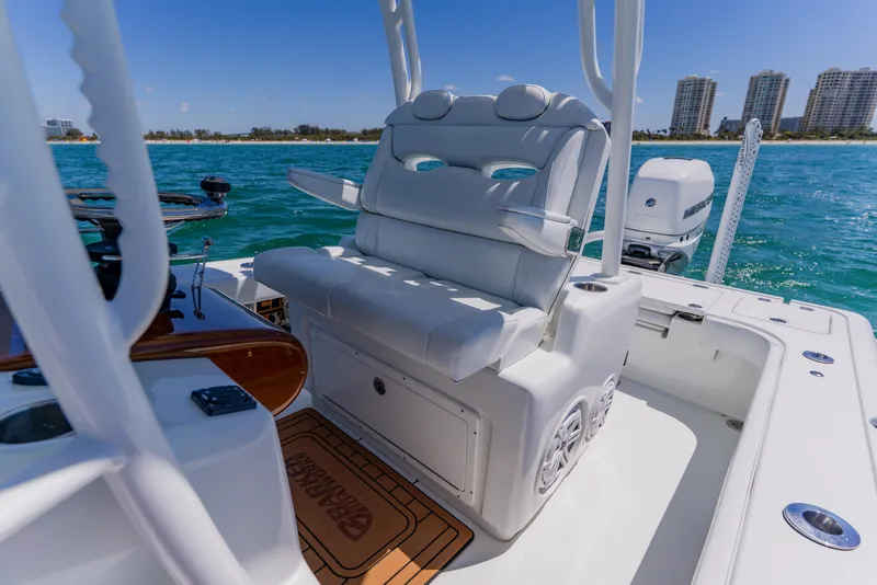 Slide: The Image of 2017 Barker Boatworks 26 with luxurious seating on a sunny day at sea. - 25