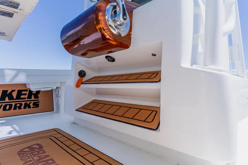 Slide: The Image of 2017 Barker Boatworks 26 interior detail with custom wood accents and branded flooring. - 31