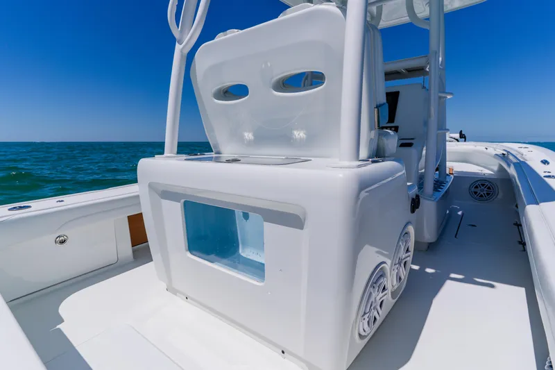 Slide: The Image of 2017 Barker Boatworks 26 on open water, showcasing sleek design and spacious deck. - 36