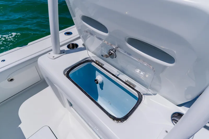 Slide: The Image of 2017 Barker Boatworks 26 with open storage compartment on deck. - 37