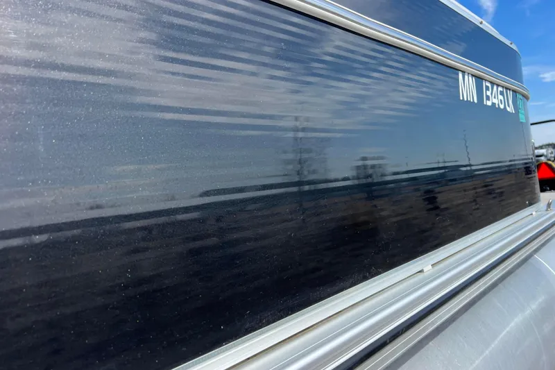 Slide: The Image of Close-up of a 2015 Avalon Catalina Cruise boat with registration number MN 1346 LK. - 15