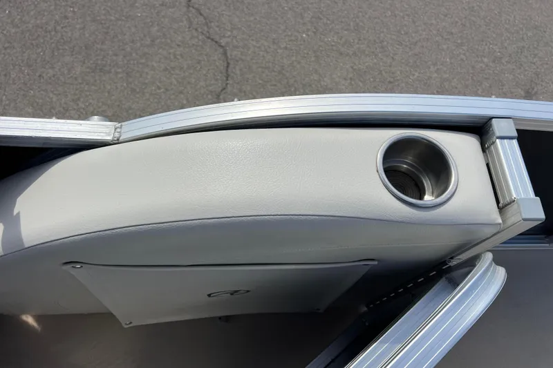 Slide: The Image of Avalon Catalina Cruise 2015 boat seat with integrated cup holder, gray upholstery. - 31