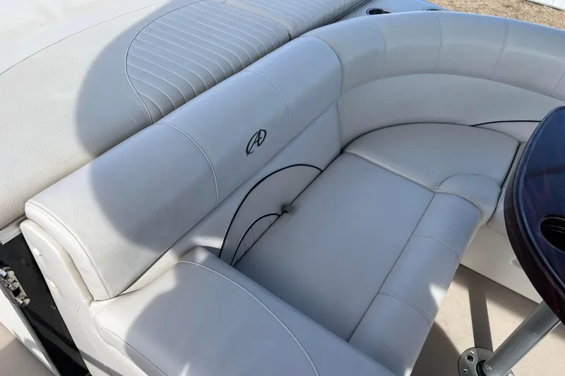 Slide: The Image of Luxurious seating on 2015 Avalon Catalina Cruise 23' boat with elegant white upholstery. - 34