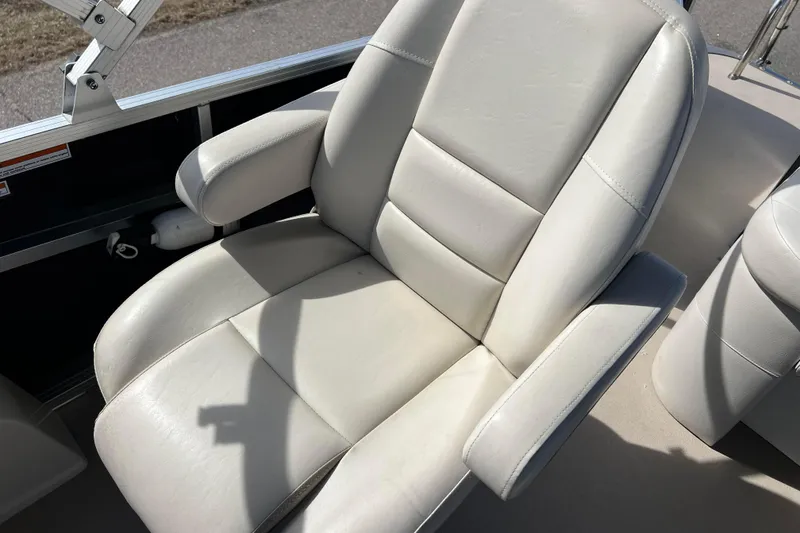 Slide: The Image of Luxurious white captain's chair on 2015 Avalon Catalina Cruise 23' boat. - 41