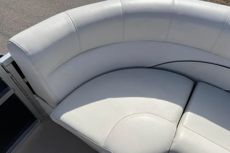 Slide: The Image of 2015 Avalon Catalina Cruise 23' boat with white leather seating. - 47