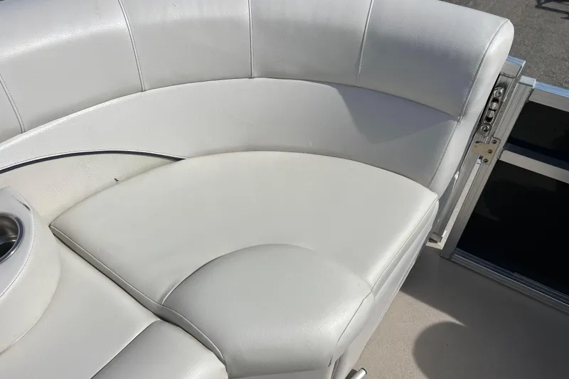 Slide: The Image of White leather seating on 2015 Avalon Catalina Cruise 23' boat. - 48